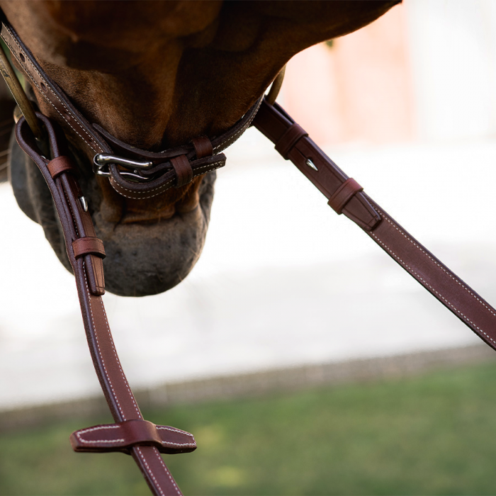Raised leather contact reins